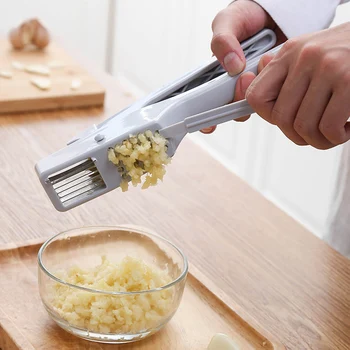 1pc New Plastic Garlic Press Manual Crusher Kitchen Tool Magic Cutter Garlic Manual Type Presses Creative Garlic Presses
1pc New Plastic Garlic Press Manual Crusher Kitchen Tool Magic Cutter Garlic Manual Type Presses Creative Garlic Presses