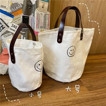 2020 new female bag French retro wave point wild hand carry canvas bag friendly lunch box portable bucket bag female wholesale 
2020 new female bag French retro wave point wild hand carry canvas bag friendly lunch box portable bucket bag female wholesale