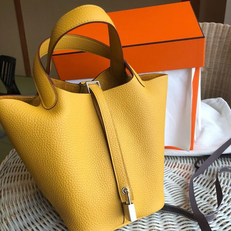 Caramel basket bag real skin bucket bag litchi grain head layer cowhide simple 100 lap handbag
Caramel basket bag real skin bucket bag litchi grain head layer cowhide simple 100 lap handbag