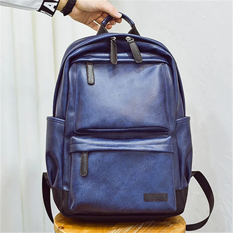New fashion men's backpack retro casual computer backpack explosions travel bag tide leather backpack 
New fashion men's backpack retro casual computer backpack explosions travel bag tide leather backpack