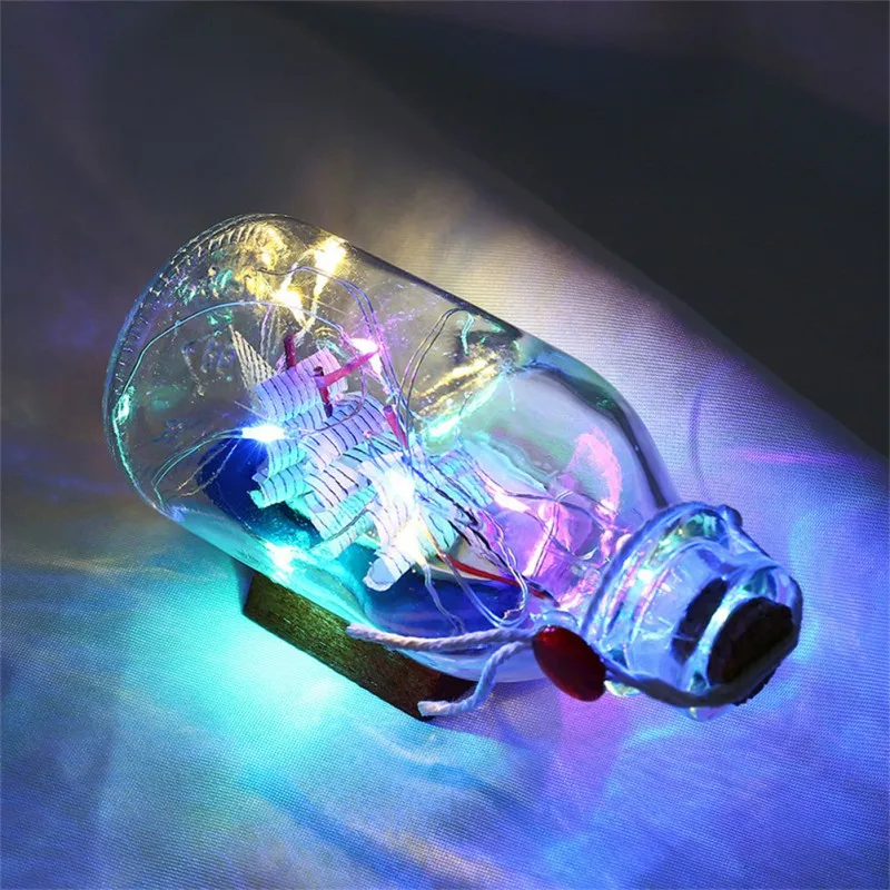String Lights bottle Illuminated Night Light Sailing Boat Box Copper Wire Light Wood Base Drifting Home Garden Decoration
String Lights bottle Illuminated Night Light Sailing Boat Box Copper Wire Light Wood Base Drifting Home Garden Decoration
