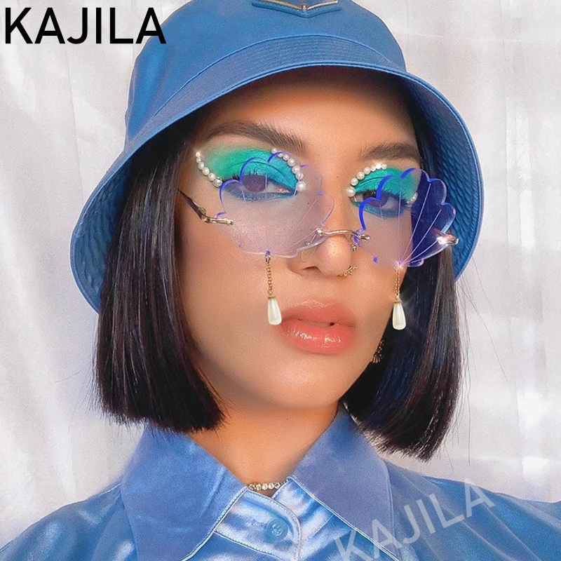 Pearl Tassel Rimless Sunglasses Women 2020 Fashion Brand Designer Shell Shape Vintage Frameless Sun Glasses For Woman Oculos
Pearl Tassel Rimless Sunglasses Women 2020 Fashion Brand Designer Shell Shape Vintage Frameless Sun Glasses For Woman Oculos