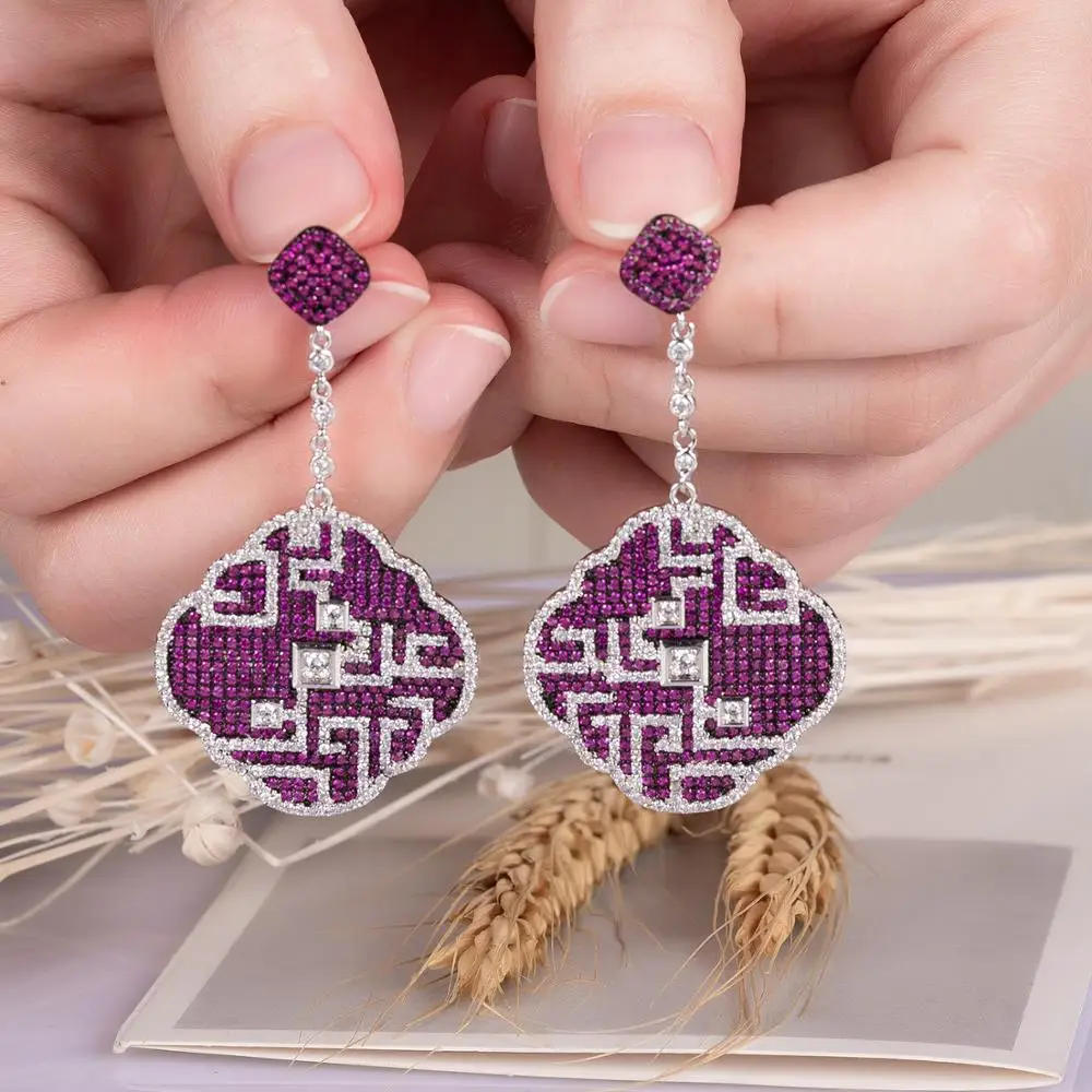 European and American designer luxury ladies banquet with large lattice color separation cubic zirconia earrings high-end fashio
European and American designer luxury ladies banquet with large lattice color separation cubic zirconia earrings high-end fashio