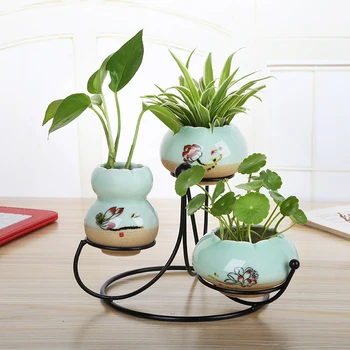 Northern Europe green rose flowerpot creative ceramic hydroponic vase simple living room TV cabinet decorative ornaments 
Northern Europe green rose flowerpot creative ceramic hydroponic vase simple living room TV cabinet decorative ornaments