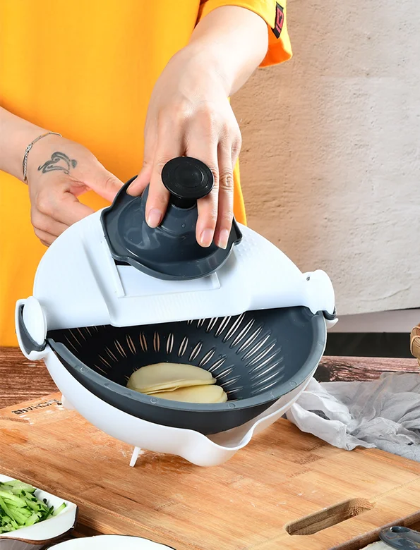 Multifunctional Magic Rotate Vegetable Cutter with Drain Basket Kitchen Veggie Fruit Shredder Grater Slicer Home Gadgets
Multifunctional Magic Rotate Vegetable Cutter with Drain Basket Kitchen Veggie Fruit Shredder Grater Slicer Home Gadgets