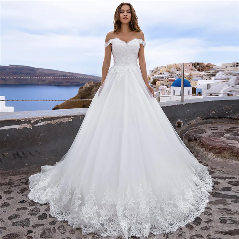 White Off Shoulder Lace Appliques Wedding Dress Lace Up Back 2021 Princess Custom Online Bridal Gowns Formal Garden Bride Dress
White Off Shoulder Lace Appliques Wedding Dress Lace Up Back 2021 Princess Custom Online Bridal Gowns Formal Garden Bride Dress
