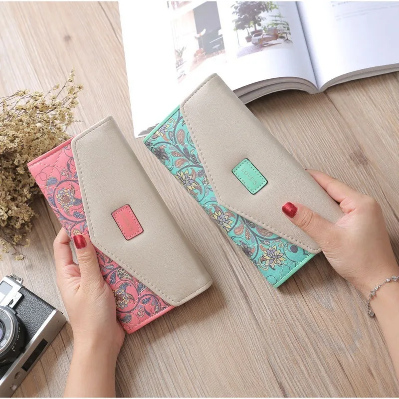 Korean version of the garden small floral rhombus hit color envelope buckle lady wallet tri-fold female bag clutch wallet
Korean version of the garden small floral rhombus hit color envelope buckle lady wallet tri-fold female bag clutch wallet