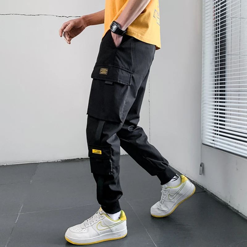 2020 Autumn New Hip Hop Joggers Plus Size Mens Black Harem Multi-Pocket Ribbons Man Sweatpants Streetwear Casual Pants XS-5XL
2020 Autumn New Hip Hop Joggers Plus Size Mens Black Harem Multi-Pocket Ribbons Man Sweatpants Streetwear Casual Pants XS-5XL