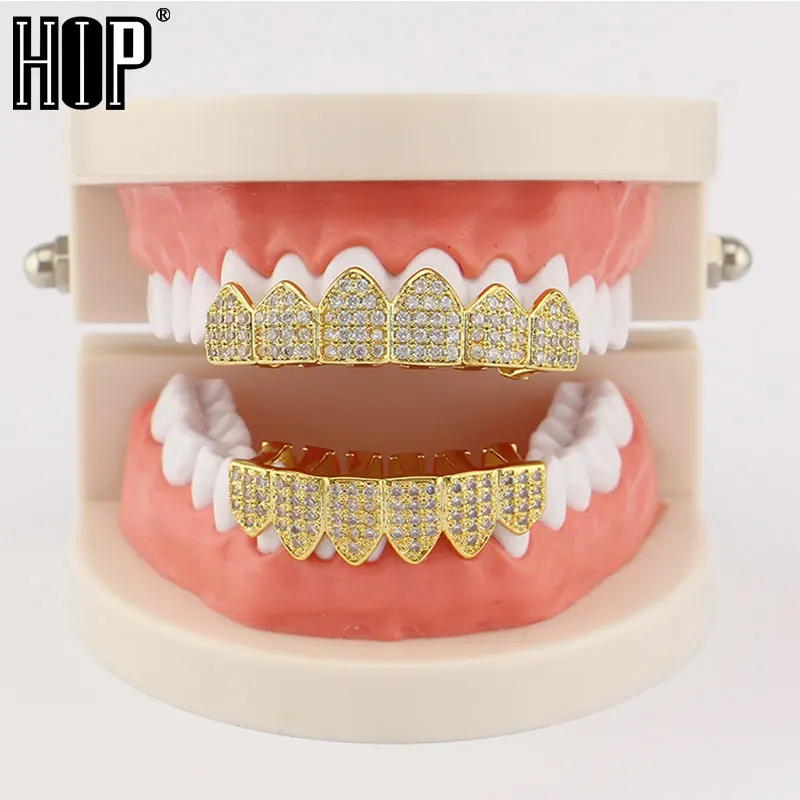 Hip Hop 1Set Iced Out Bling Teeth Cubic Zirconia Teeth Grills Top & Bottom Clown Grills Set For Men Rapper Jewelry
Hip Hop 1Set Iced Out Bling Teeth Cubic Zirconia Teeth Grills Top & Bottom Clown Grills Set For Men Rapper Jewelry