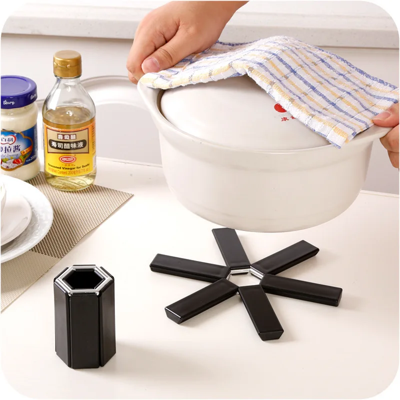 Creative Placemat Anti-Scald Non-Slip Tablemat Folding Pot Pad Plastic High Temperature Resistant Placemat Kitchen Gadgets
Creative Placemat Anti-Scald Non-Slip Tablemat Folding Pot Pad Plastic High Temperature Resistant Placemat Kitchen Gadgets