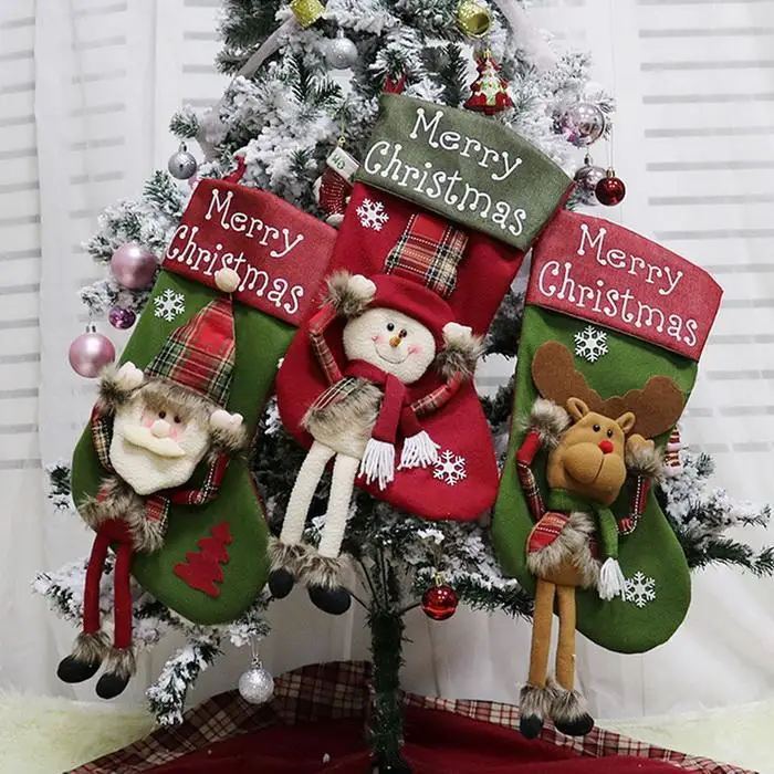 claus sock gift holder christmas tree as picture claus, snowman