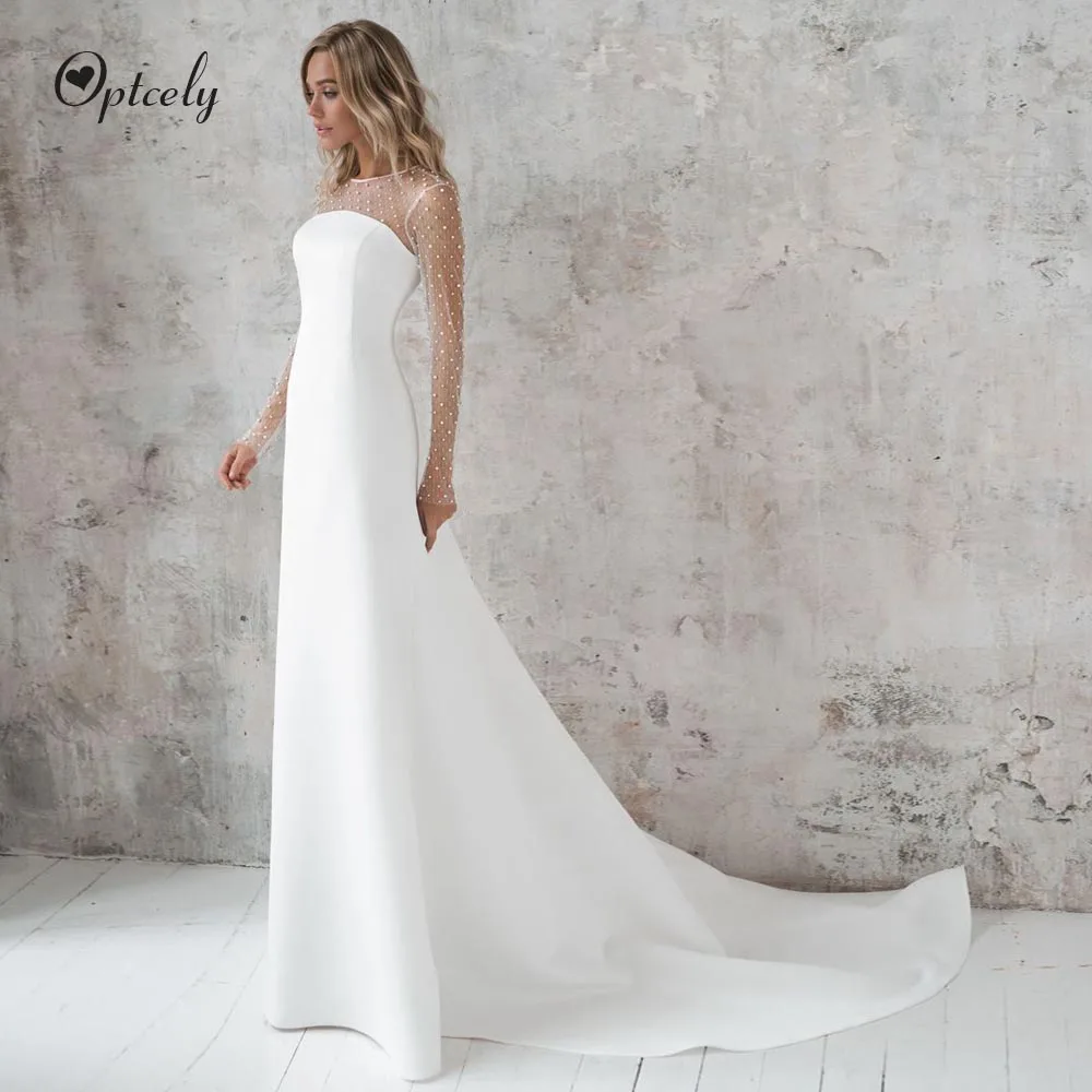 Optcely New Arrival Button O-Neck Beach Wedding Dresses 2019 Simple Beaded Long Sleeve Princess Dream Vintage Vestido de Noiva
Optcely New Arrival Button O-Neck Beach Wedding Dresses 2019 Simple Beaded Long Sleeve Princess Dream Vintage Vestido de Noiva