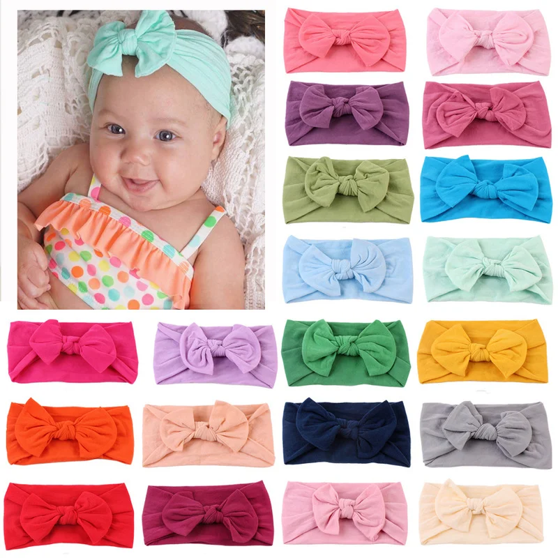 21 Colors Nylon Headband for Baby Girls Baby Boys Soft Bow Knot Turban Hair Bands Baby Hair Accessories for Children Headwear
21 Colors Nylon Headband for Baby Girls Baby Boys Soft Bow Knot Turban Hair Bands Baby Hair Accessories for Children Headwear
