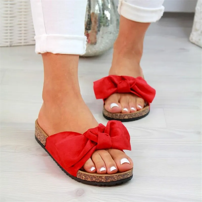 Summer Europe and the United States large explosions bow sandals women thick bottom beach sandals women 
Summer Europe and the United States large explosions bow sandals women thick bottom beach sandals women