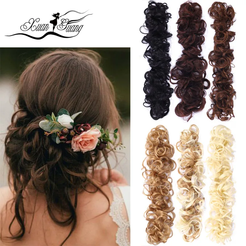 DIANQI A curly bun with a rubber band tied around the bun and a ponytail wrapped around a woman's hair
DIANQI A curly bun with a rubber band tied around the bun and a ponytail wrapped around a woman's hair