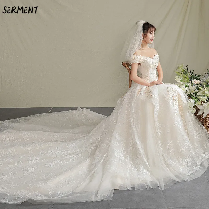 Foreign Trade Wedding Dress Manufacturers 2019 New Bride Champagne Color Word Shoulder Long Tail Female Europe The Best Seller
Foreign Trade Wedding Dress Manufacturers 2019 New Bride Champagne Color Word Shoulder Long Tail Female Europe The Best Seller