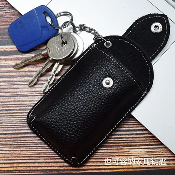 The first layer cowhide key case men's anti-skid chain wear belt buckle leather car key case 
The first layer cowhide key case men's anti-skid chain wear belt buckle leather car key case