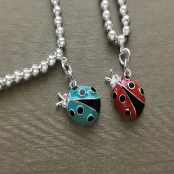 S925 pure silver 1:1 fashion cartoon red enamel, enamel blue lady ladybug beads necklace 
S925 pure silver 1:1 fashion cartoon red enamel, enamel blue lady ladybug beads necklace