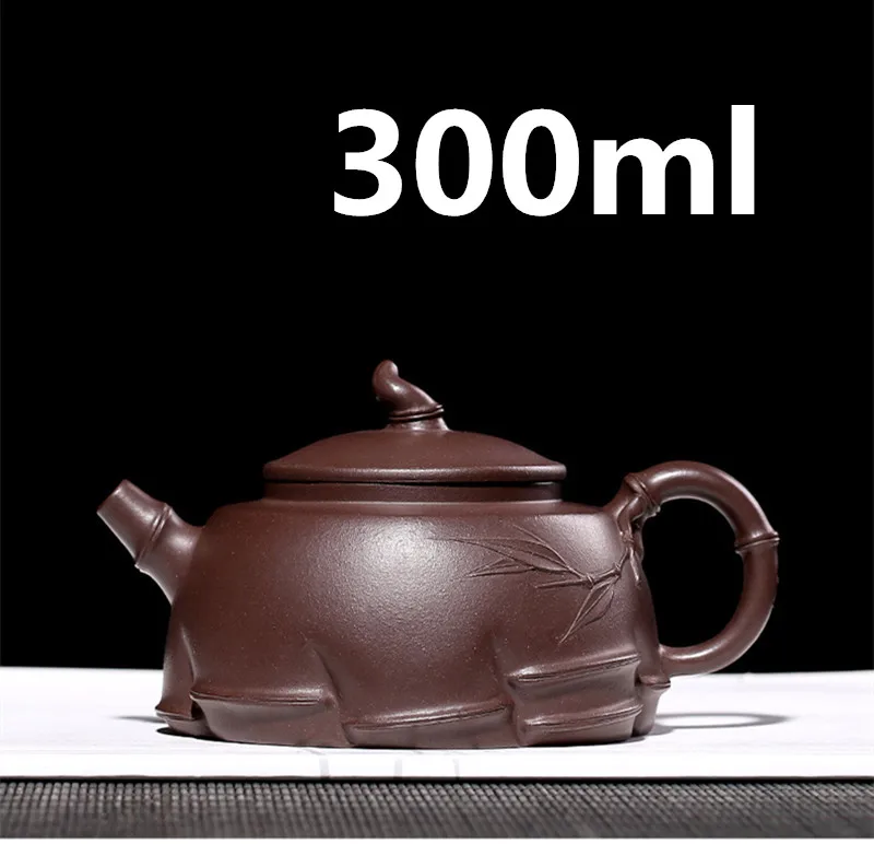 Chinese Ceramic Teapot Clay Tea pot Yixing Zisha Clay Handmade Pots Gongfu Tea Set 300ml New Arrived High Quality With Gift Box 
Chinese Ceramic Teapot Clay Tea pot Yixing Zisha Clay Handmade Pots Gongfu Tea Set 300ml New Arrived High Quality With Gift Box