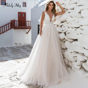 Adoly Mey New Arrival Scoop Neck Backless Tulle A-Line Wedding Dress 2020 Luxury Beaded Appliques Court Train Vintage Bride Gown
Adoly Mey New Arrival Scoop Neck Backless Tulle A-Line Wedding Dress 2020 Luxury Beaded Appliques Court Train Vintage Bride Gown