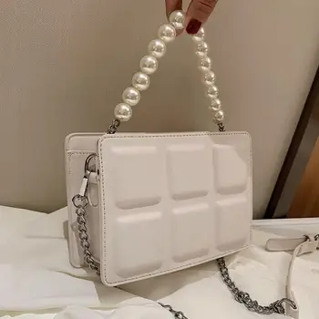 Elegant Female Pearl Tote bag 2020 New High-quality PU Leather Women's Designer Handbag Chain Shoulder Messenger Bag Square bag 
Elegant Female Pearl Tote bag 2020 New High-quality PU Leather Women's Designer Handbag Chain Shoulder Messenger Bag Square bag
