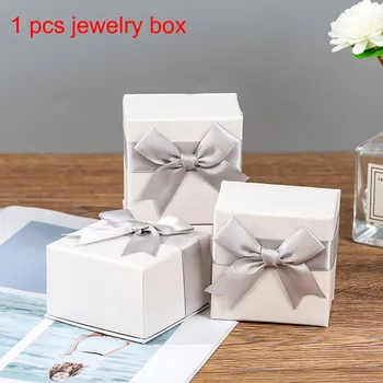 1pcs 7*7*4.5cm Jewelry Display Packaging Box High-end Rings Necklace Box with Ribbon Bowknot Gift Boxes for Jewelry Accessories
1pcs 7*7*4.5cm Jewelry Display Packaging Box High-end Rings Necklace Box with Ribbon Bowknot Gift Boxes for Jewelry Accessories