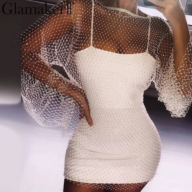 Glamaker Hollow out diamond party women dress Vintage transparent sexy dress Retro club summer dress 2019 vestidos de fiesta
Glamaker Hollow out diamond party women dress Vintage transparent sexy dress Retro club summer dress 2019 vestidos de fiesta