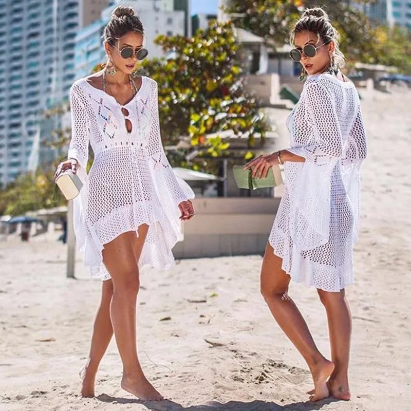 Seazea Sexy Beach Dress Solid Tunics Hollow Cover Up Saida De Praia 2019 New Bikini Cover Long Sleeve Beachwear Pareos De Playa
Seazea Sexy Beach Dress Solid Tunics Hollow Cover Up Saida De Praia 2019 New Bikini Cover Long Sleeve Beachwear Pareos De Playa