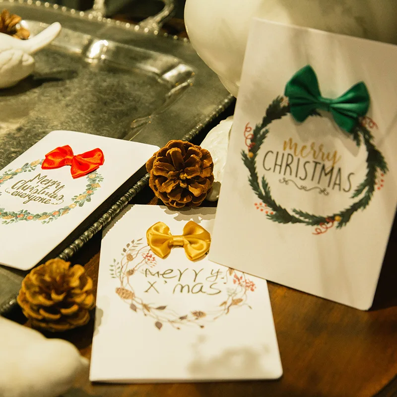 10pcs/lot Folding Merry Christmas Card with Decorative Ribbon Bow Happy New Year Greeting Card
10pcs/lot Folding Merry Christmas Card with Decorative Ribbon Bow Happy New Year Greeting Card