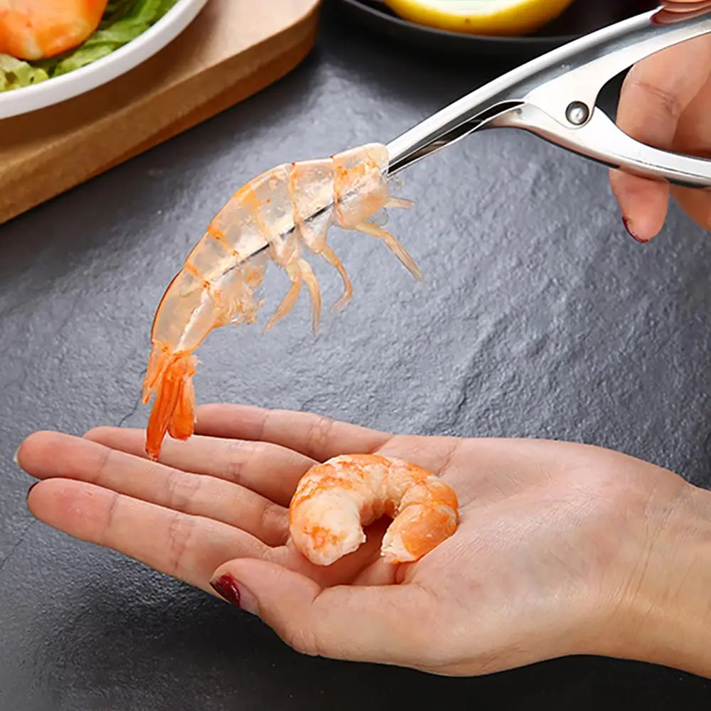Shrimp Peeler Stainless Steel Prawn Peeler Shrimp Cleaner Peel Lobster Seafood Tools Kitchen Accessories Skinning Knife
Shrimp Peeler Stainless Steel Prawn Peeler Shrimp Cleaner Peel Lobster Seafood Tools Kitchen Accessories Skinning Knife