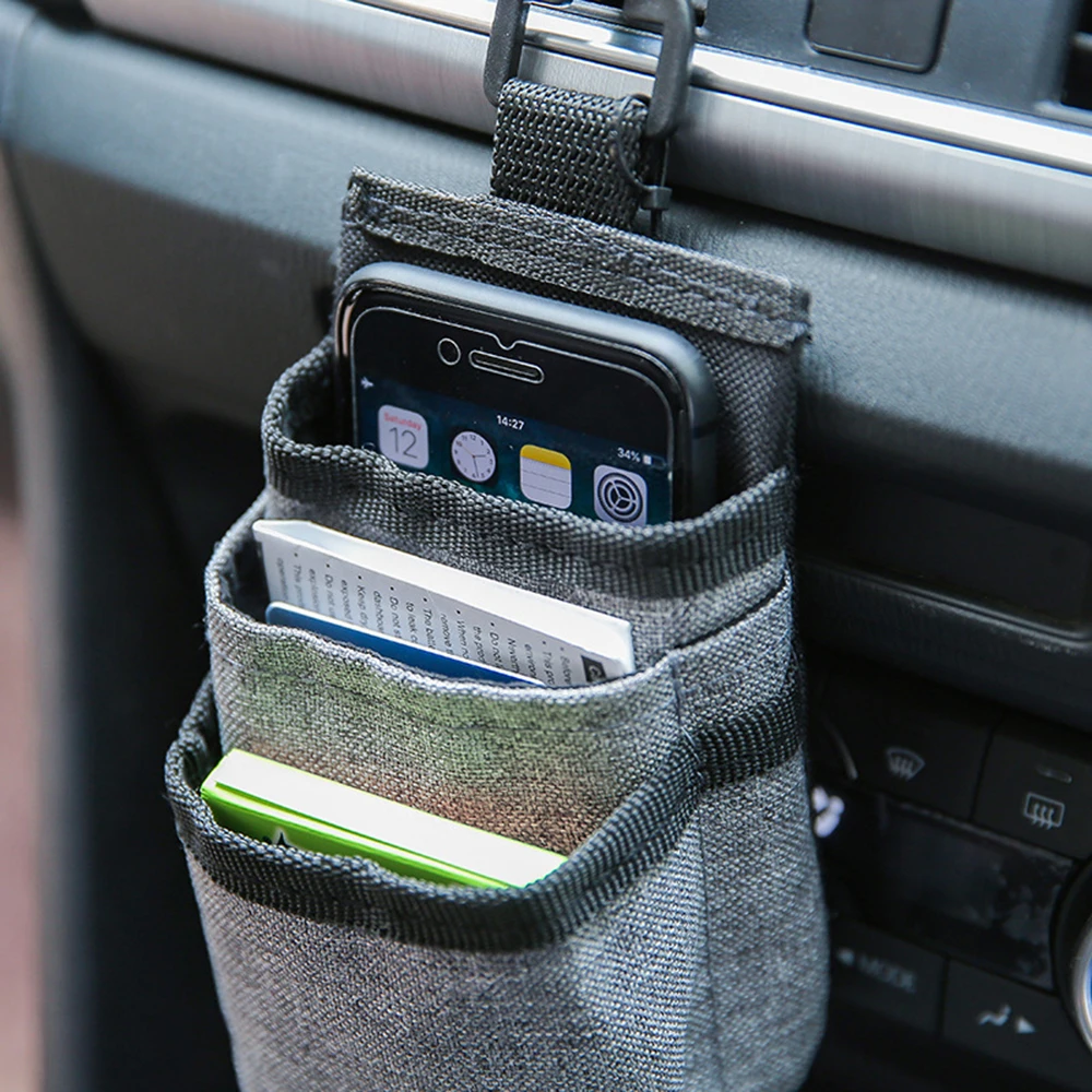 High Quality Car Air Vent Pocket Mobile Phone Pouch Small Auto Car Storage Bag Organizer Stowing Tidying
High Quality Car Air Vent Pocket Mobile Phone Pouch Small Auto Car Storage Bag Organizer Stowing Tidying