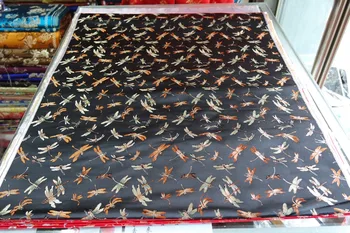 chinese traditional silk brocade fabric black back with yellow and light gold colorful dragon fly dragonfly pattern design
chinese traditional silk brocade fabric black back with yellow and light gold colorful dragon fly dragonfly pattern design