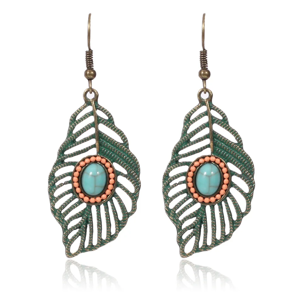 Handmade Hollow Out Leaf Water Droplets Red Stone Dangle Earring for women Bohemian Vintage Metal Earrings
Handmade Hollow Out Leaf Water Droplets Red Stone Dangle Earring for women Bohemian Vintage Metal Earrings