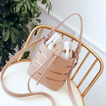 TTOU Casual Bucket Solid Color Hollow PU Leather Small Fairy Bag Portable Bucket Bag Drawstring Shoulder Messenger Bag Handbag
TTOU Casual Bucket Solid Color Hollow PU Leather Small Fairy Bag Portable Bucket Bag Drawstring Shoulder Messenger Bag Handbag