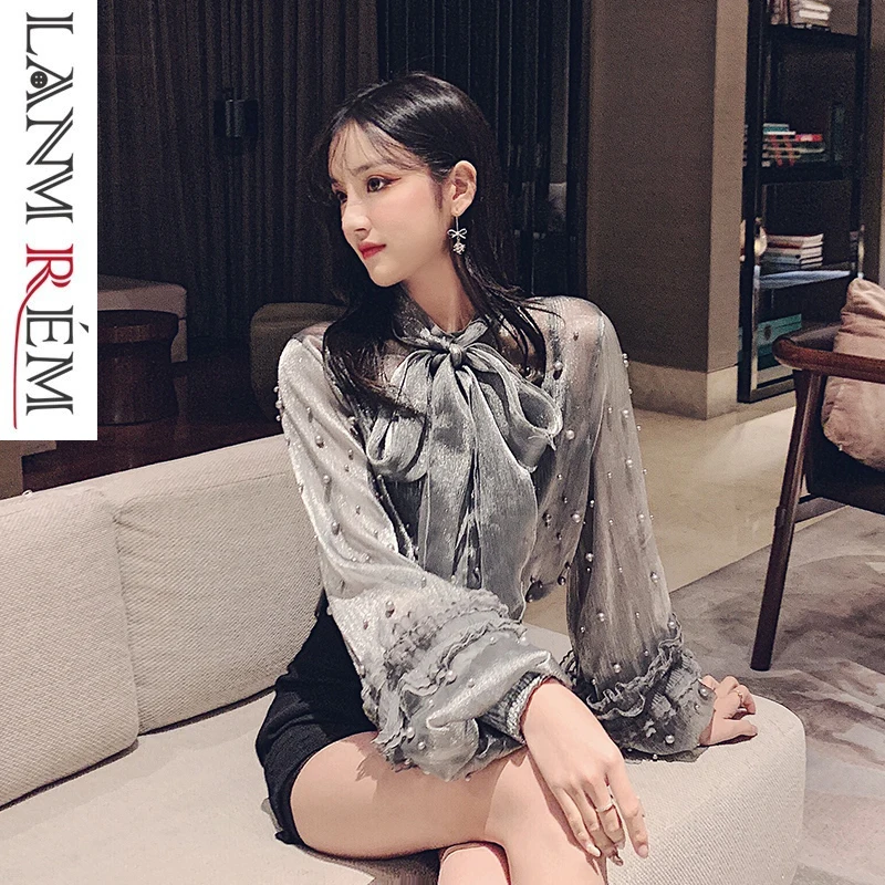 LANMREM 2019 Women Fashion Imitation Pearls Lace-up Bow Collar Chiffon Shirt Spring Long Lantern Sleeve Solid Color Tops TB283
LANMREM 2019 Women Fashion Imitation Pearls Lace-up Bow Collar Chiffon Shirt Spring Long Lantern Sleeve Solid Color Tops TB283