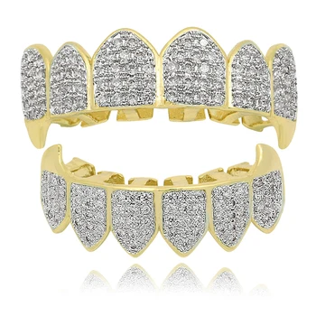 Hip Hop Fang Teeth Grillz Set Gold Color Micro Pave Cubic Zircon Top & Bottom teeth GRILLZ mouth teeth grilling sets
Hip Hop Fang Teeth Grillz Set Gold Color Micro Pave Cubic Zircon Top & Bottom teeth GRILLZ mouth teeth grilling sets