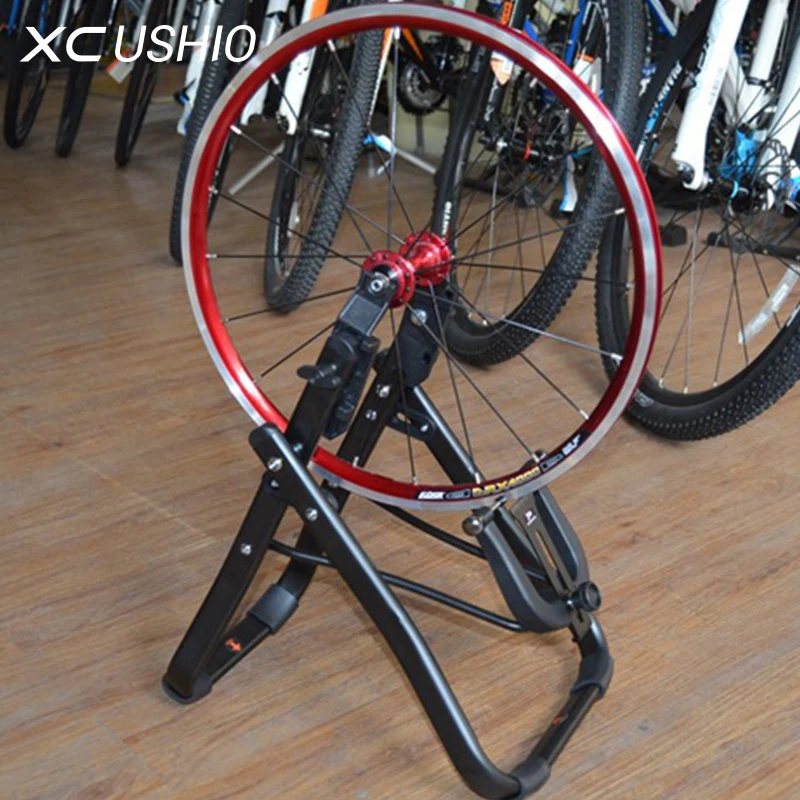 Aluminum Alloy Bicycle Wheel Truing Stand Folding Front and Rear Conversion Bike Wheel Maintenance Support Bicyle Repair Tool
Aluminum Alloy Bicycle Wheel Truing Stand Folding Front and Rear Conversion Bike Wheel Maintenance Support Bicyle Repair Tool