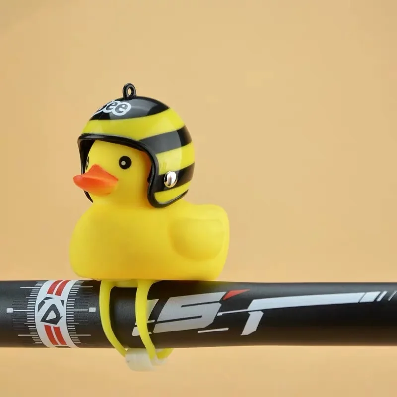 Bicycle light Small yellow duck with helmet road bike motorcycle bell child riding horn light broken wind duck
Bicycle light Small yellow duck with helmet road bike motorcycle bell child riding horn light broken wind duck