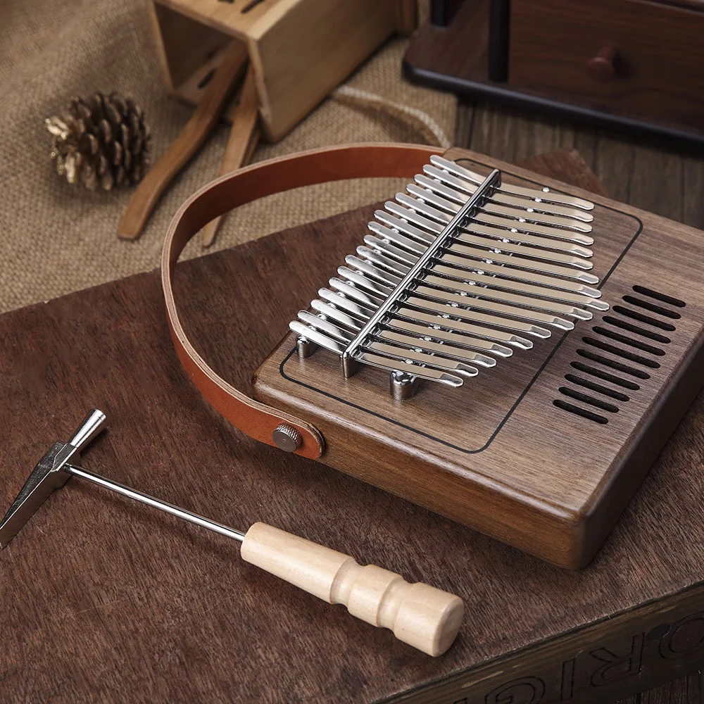 TOM TK - R1 17-Key Kalimba Thumb Piano Walnut Wood Musical Instrument Keyboard Instruments With Notes Sticker Tuning Hammer
TOM TK - R1 17-Key Kalimba Thumb Piano Walnut Wood Musical Instrument Keyboard Instruments With Notes Sticker Tuning Hammer