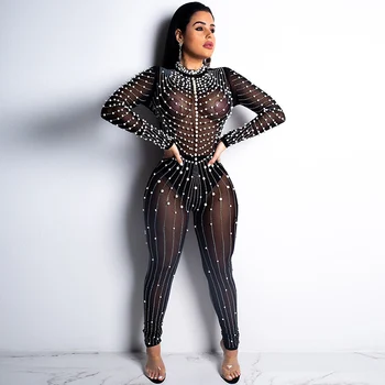 Sexy Mesh Sheer Jumpsuit Pearls Women Transparent Romper See Through Nightclub Bar Stage Long Sleeve Beads Catsuit Hollow Out
Sexy Mesh Sheer Jumpsuit Pearls Women Transparent Romper See Through Nightclub Bar Stage Long Sleeve Beads Catsuit Hollow Out