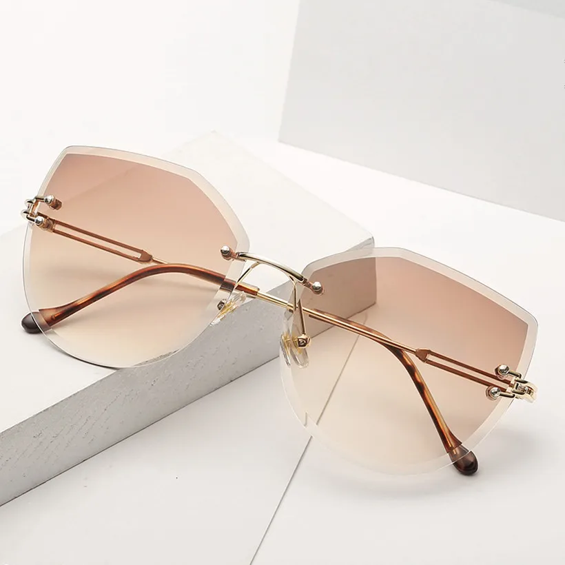 NYWOOH Rimless Sunglasses Women Cat Eye Sun Glasses Ladies Luxury Gradient Shades Sunglass Metal Frame
NYWOOH Rimless Sunglasses Women Cat Eye Sun Glasses Ladies Luxury Gradient Shades Sunglass Metal Frame