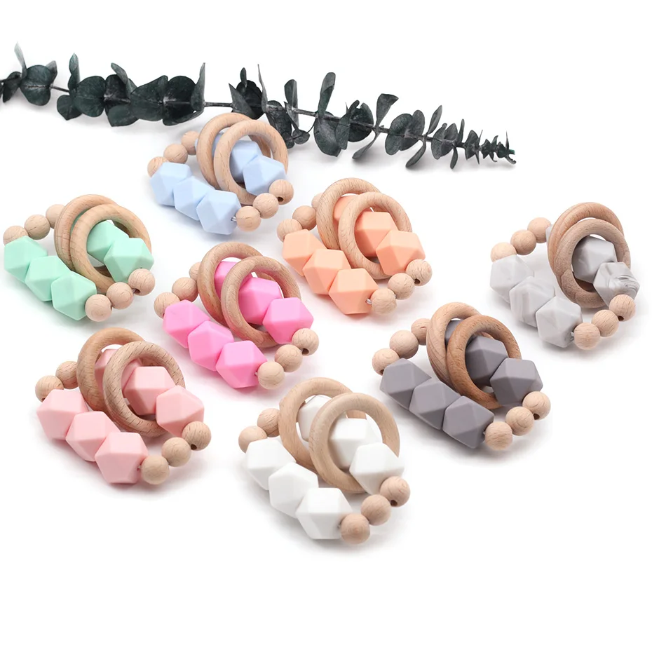 1pc Baby Silicone Teething Teether Bracelet Food Grade Silicone Beads Natural Wood Ring Wooden Beads Children's Handmade Toys
1pc Baby Silicone Teething Teether Bracelet Food Grade Silicone Beads Natural Wood Ring Wooden Beads Children's Handmade Toys