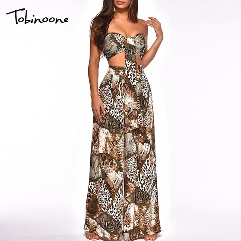 Tobinoone Elegant off shoulder women jumpsuit Sleeveless bow tie overall romper Sexy causual female long summer jumpsuit 2019
Tobinoone Elegant off shoulder women jumpsuit Sleeveless bow tie overall romper Sexy causual female long summer jumpsuit 2019