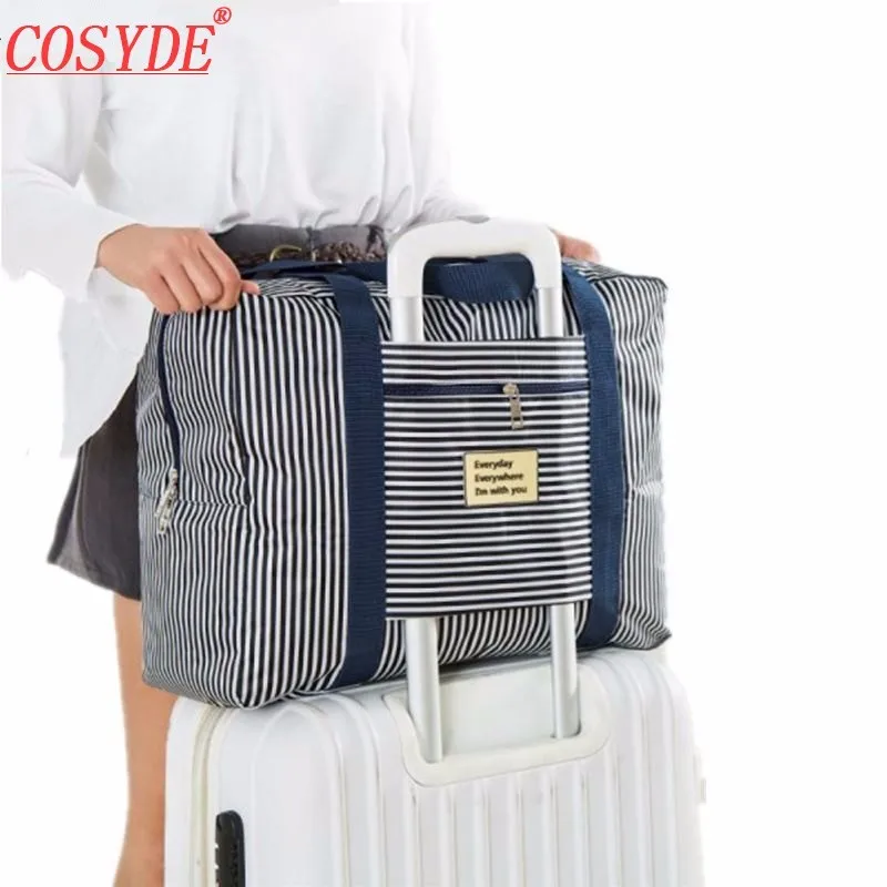 2018 New Waterproof Travel Bag Large Capacity Tote Bags Women Folding Clothes Bag Luggage Travel Handbag Striped Dot Trolley Bag
2018 New Waterproof Travel Bag Large Capacity Tote Bags Women Folding Clothes Bag Luggage Travel Handbag Striped Dot Trolley Bag