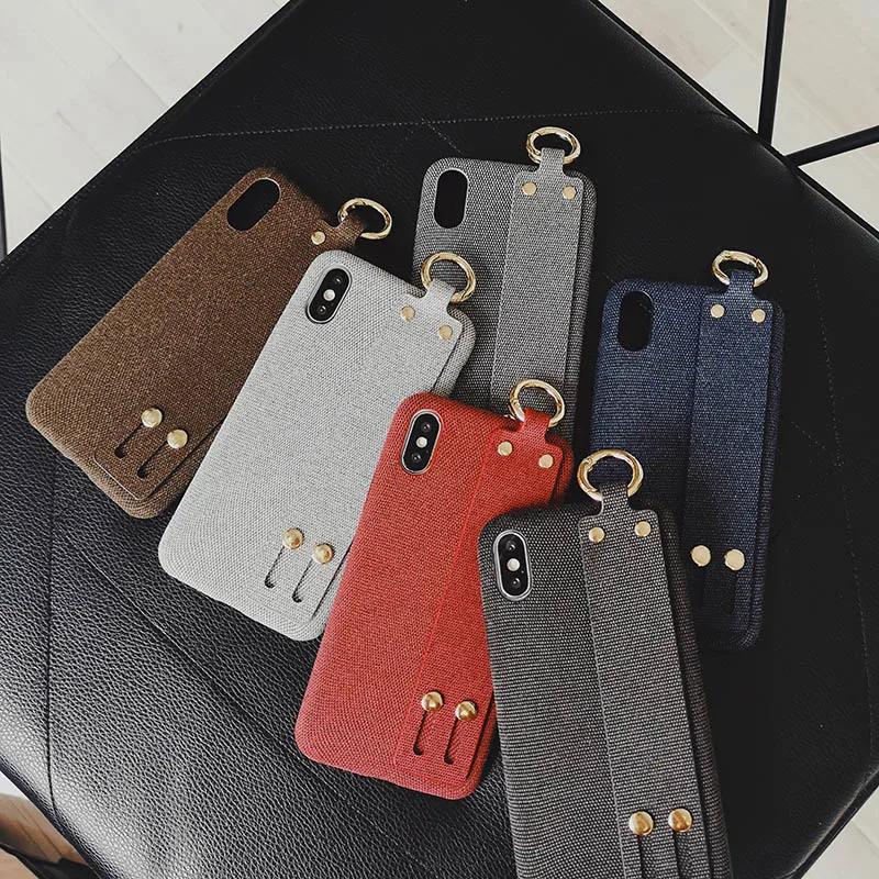 Plain Color Wrist Band Case For Iphone X XR XS Max Finger Ringer Holder Cover For Iphone 6 6S 7 8 Plus Luxury Kickstand Coque
Plain Color Wrist Band Case For Iphone X XR XS Max Finger Ringer Holder Cover For Iphone 6 6S 7 8 Plus Luxury Kickstand Coque