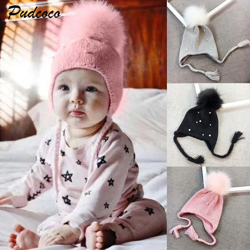 2018 Baby Pearls Hats Newborn Baby Girl Boy Fur Pom Bobble Cap New Winter Knit Crochet Warm Downy Hairball Beanie Hat
2018 Baby Pearls Hats Newborn Baby Girl Boy Fur Pom Bobble Cap New Winter Knit Crochet Warm Downy Hairball Beanie Hat