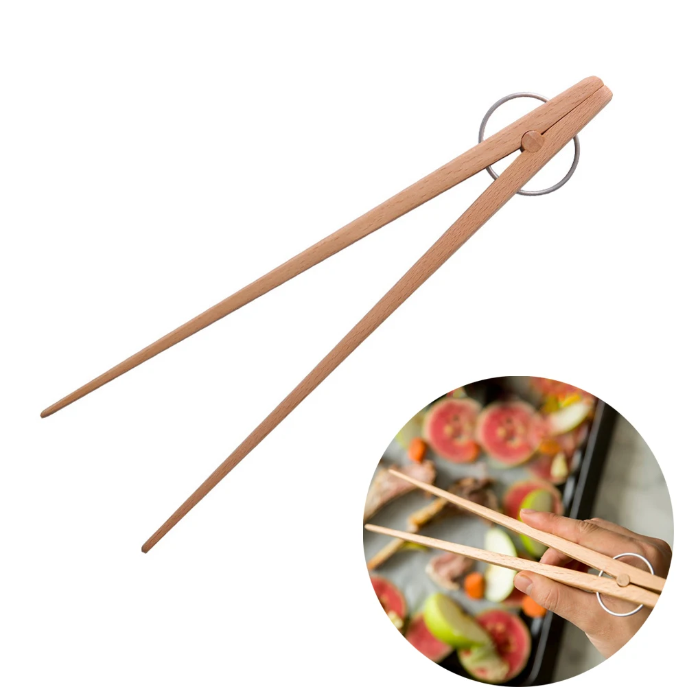 25cm Clamp Cake Wooden Grip Food Kitchen Multifunction Snack Bread Long Handle Tongs BBQ Tools
25cm Clamp Cake Wooden Grip Food Kitchen Multifunction Snack Bread Long Handle Tongs BBQ Tools