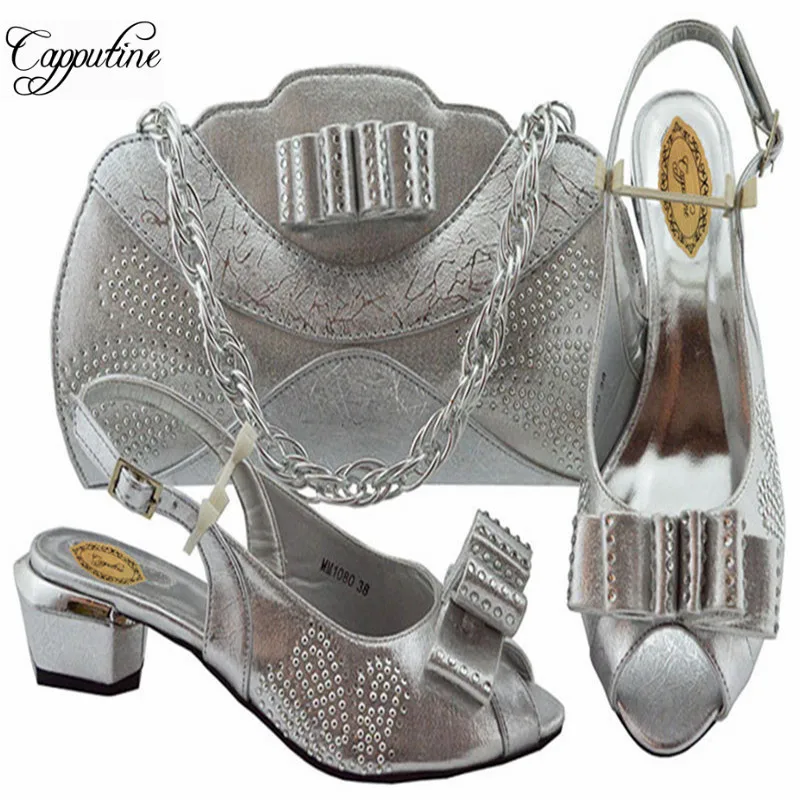 Capputine Latest African Fashion Shoes And Bag Set Italian Style Middle Heels 4.5CM Shoes And Bag Set For Party Summer Shoes
Capputine Latest African Fashion Shoes And Bag Set Italian Style Middle Heels 4.5CM Shoes And Bag Set For Party Summer Shoes