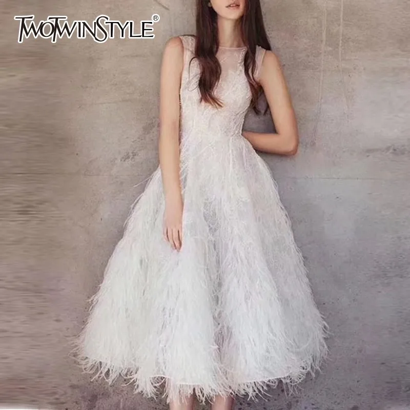 TWOTWINSTYLE Party Dress Female O Neck Sleeveless Embroidery Beading Feather Midi Dresses Women Elegant Fashion 2019 Summer
TWOTWINSTYLE Party Dress Female O Neck Sleeveless Embroidery Beading Feather Midi Dresses Women Elegant Fashion 2019 Summer
