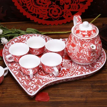 Chinese wedding ceramic gift tea pot teacup happy character red teapot heart-shaped tray set teaware marriage celebration
Chinese wedding ceramic gift tea pot teacup happy character red teapot heart-shaped tray set teaware marriage celebration